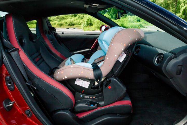 Почему нельзя перевозить ребенка на переднем кресле автомобиля?